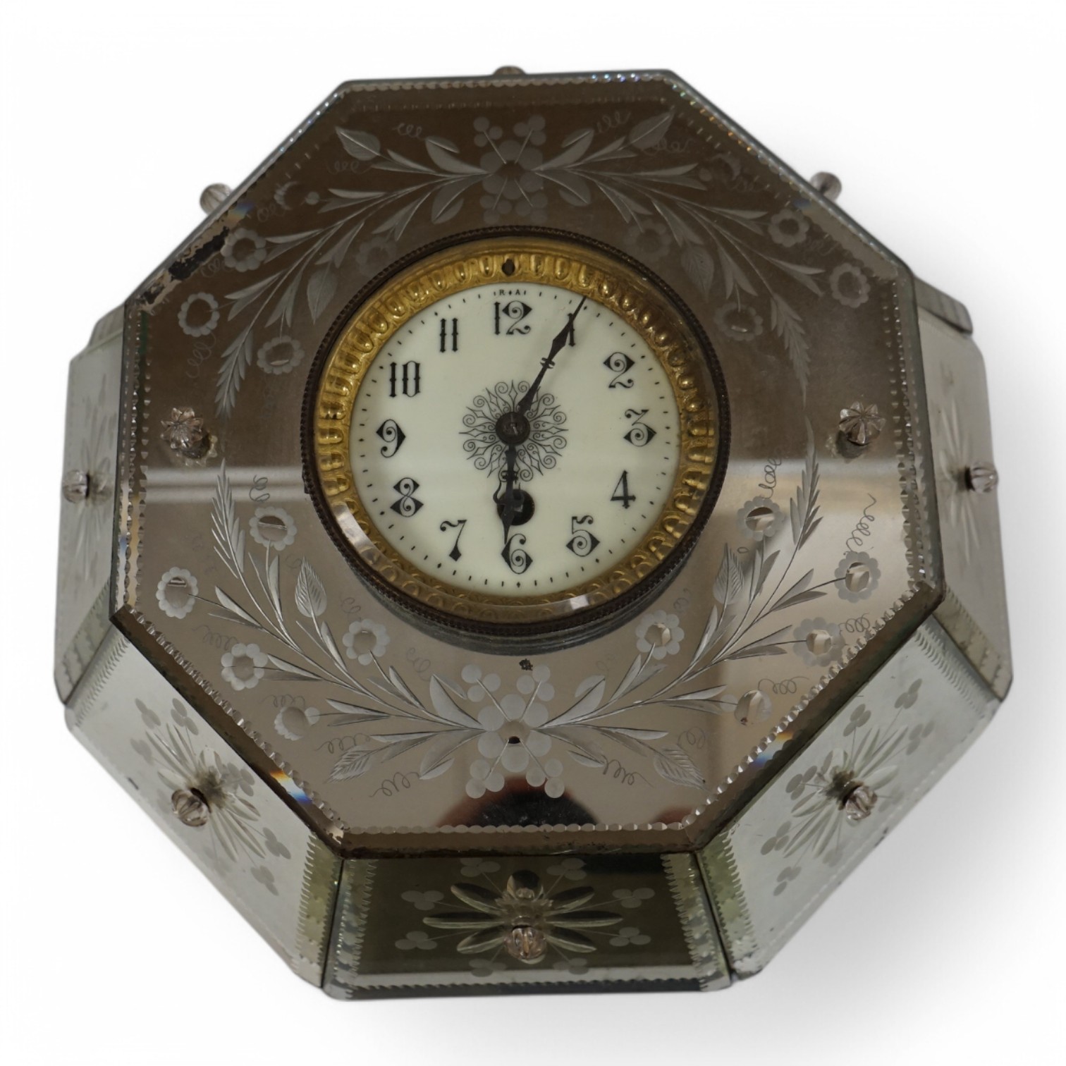 An early 20th century Venetian wheel engraved and mirrored glass octagonal wall clock, 30cm. Condition - fair to good, not tested